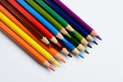 Colorful pencils on white background