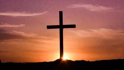Silhouette Cross at Sunset