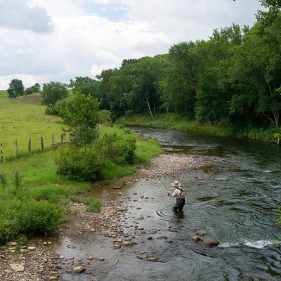 Man fly fishing in river