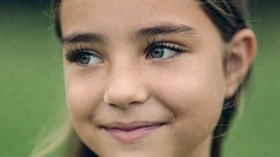 Smiling girl with green eyes