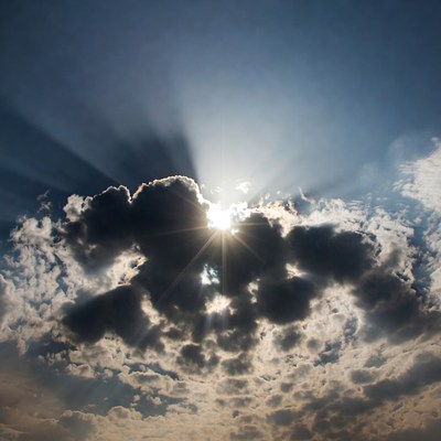 Sun Rays Through Dark Clouds