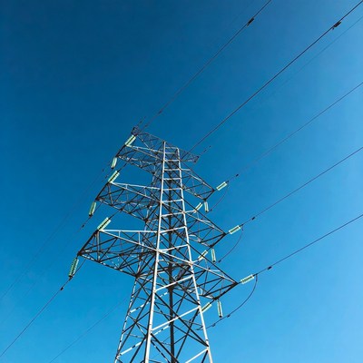 Electricity Pylon Against Blue Sky
