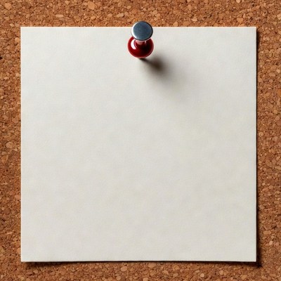 Red pushpin on blank note