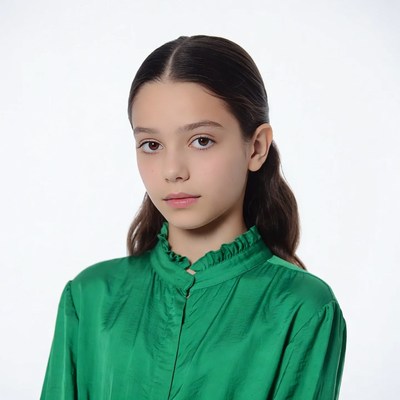 Girl in green ruffled blouse
