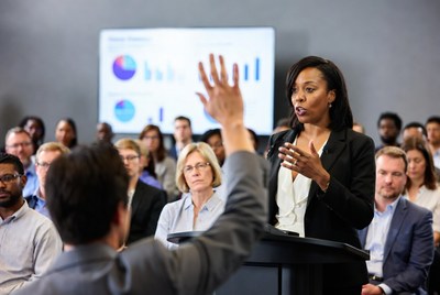 African-American woman speaking at conference