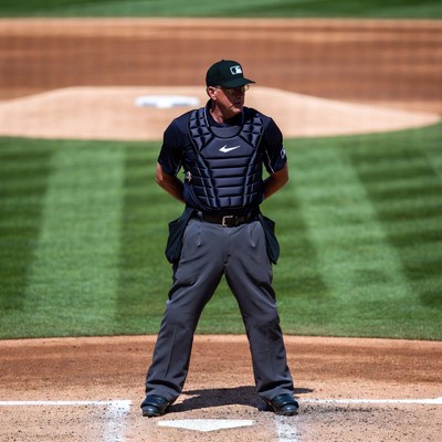 Baseball umpire standing behind home plate