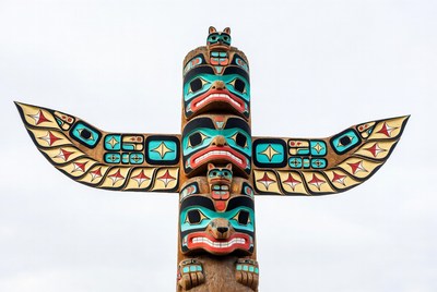 Colorful Totem Pole with Eagles and Bear