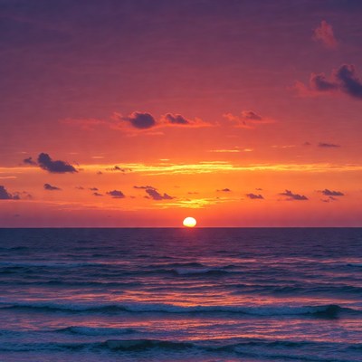 Sunset over ocean waves