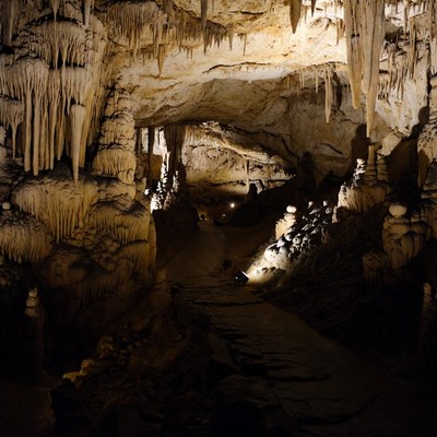 Stalactites in Illuminated Cave Path