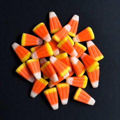 Pile of Candy Corn on Black Background