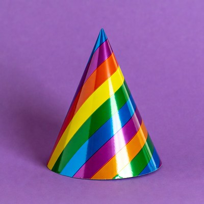 Rainbow Party Hat on Purple Background