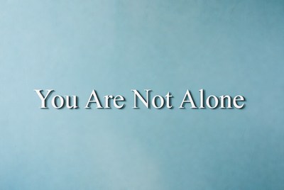 You Are Not Alone text