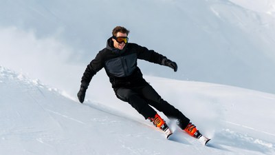 Man skiing down snowy slope