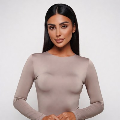 Beautiful Middle Eastern woman in taupe dress