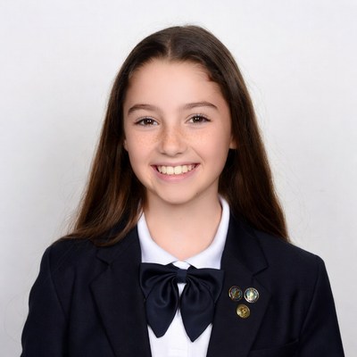 Girl smiling in school uniform