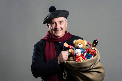 Man holding Santa sack of toys