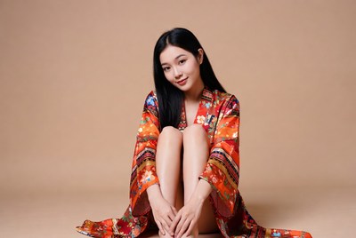 Asian woman in colorful silk robe