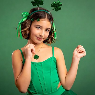 Girl in green shamrock St. Patrick's headband