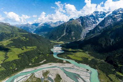 Aerial View of Turquoise River in Alps