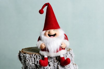 Smiling Santa Gnome on Tree Stump