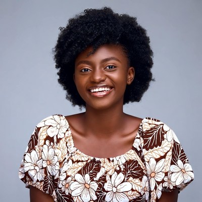 Smiling African woman with afro hairstyle