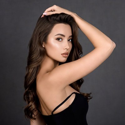 Beautiful Asian woman hand on head