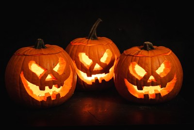 Three Jack-o-Lanterns on Black Background
