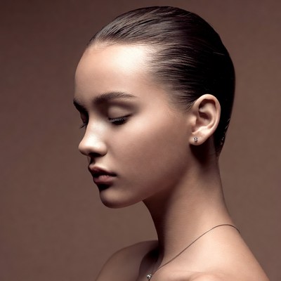 Profile of young woman with closed eyes