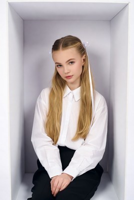 Blonde girl in white shirt box