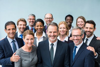 Diverse business team smiling together