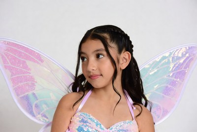 Latina girl in pink fairy costume