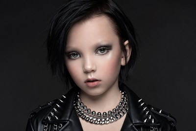 Girl in studded leather jacket