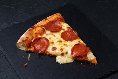Pepperoni Pizza Slice on Black Slate