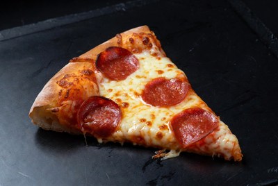 Pepperoni Pizza Slice on Black Slate
