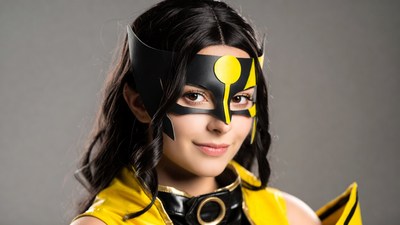 Woman in Black and Yellow Superhero Mask