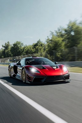 Red Race Car Speeding on Track