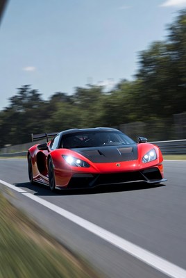 Red Lamborghini Huracan racing on track