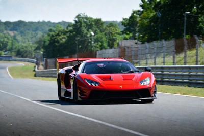 Red Ferrari Supercar on Racetrack