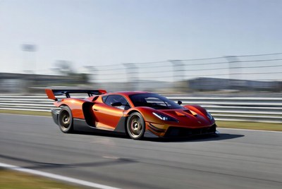 Orange Supercar Speeding on Racetrack
