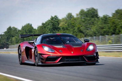 Red Koenigsegg Jesko racing on track