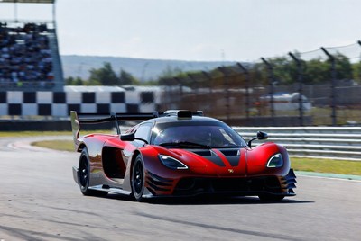 Red Koenigsegg Jesko racing on track