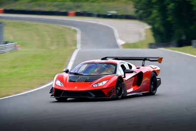 Red Lamborghini Huracan on racetrack