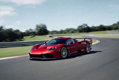 Red Supercar Speeding on Racetrack