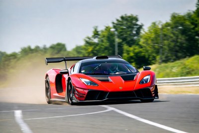 Red Race Car Drifting on Track