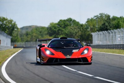 Red Koenigsegg Jesko racing on track