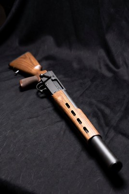 Modern Bolt-Action Rifle with Suppressor