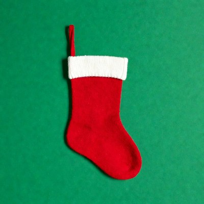 Red Christmas Stocking on Green Background