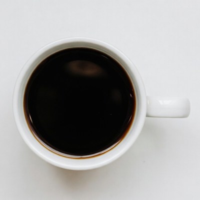 Black coffee in white cup
