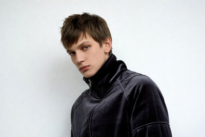 Young man in velvet jacket