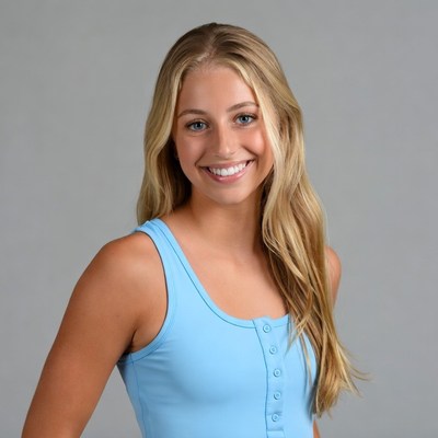 Smiling blonde girl in blue tank top